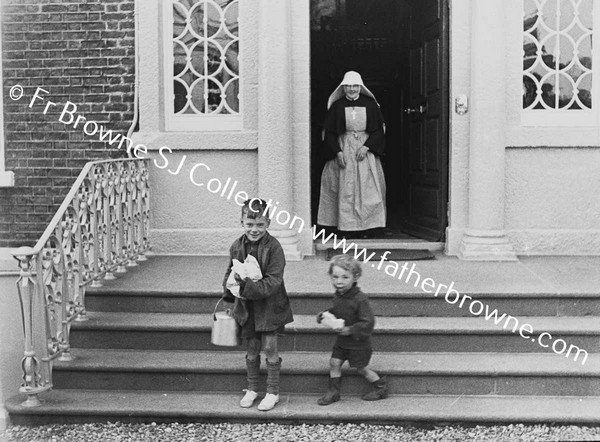 SISTER CORA (MT STANNE'S MILLTOWN),WITH POOR CHILDREN